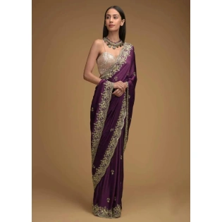 Wine Purple Saree In Satin With Hand Embroidered Scalloped Border And Floral Buttis Along With Unstitched Blouse