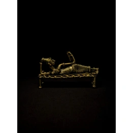 Dhokra - Tribal Lady Sleeping on Bed and Reading