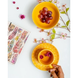 Elegant yellow cup and saucer set